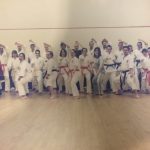 A group photo of a karate class in 1999