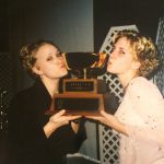 Jen, Becky K. posing with her trophy At 2002-2003 Athletic Banquet