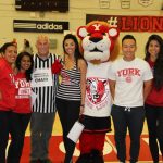 Kinesiology and Health Science Chair with students and the mascot