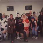 An old photo of people in Halloween costumes