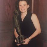 Gillian McCullough holding a trophy