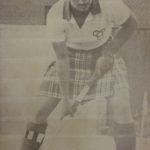 An old photo of a female indoor hockey player