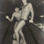 An old photo of two male swimmers posing