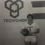 An old photo of a Yeowoman holding a basketball