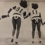 An old photo of figure skaters with their shorts spelling \\\"YORK\\\"