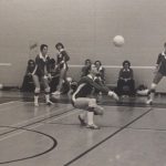 An old photo of Women\'s Volleyball Team in play