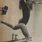 An old photo of a female gymnast practicing