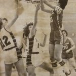 An old photo of female basketball players in play