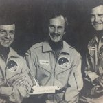 An old photo of Steve Maclean and two other astronauts
