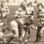 An old photo of men playing rugby