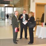 Three people having a conversation at the York Circle Lecture event