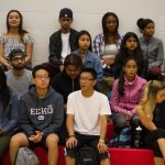 A close shot of students in the gym seating