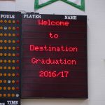 A red lcd display reading \"Welcome to Destination Graduation 2016/17\"