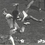 An old photo of two soccer players in action in 1976