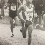 An old photo of Mario Iozzo running in track and field