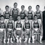An old photo of Men\\\'s Basketball team with a coach